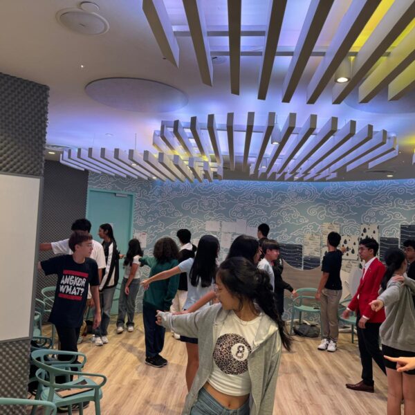 A group of young people participating in an activity in Youth Leadership and communication Camp